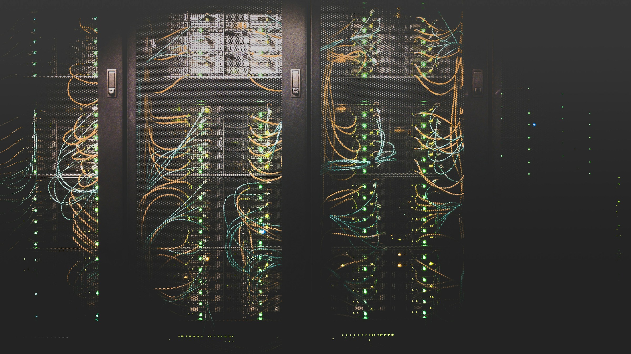 Modern server room with racks and blue-lit technology infrastructure